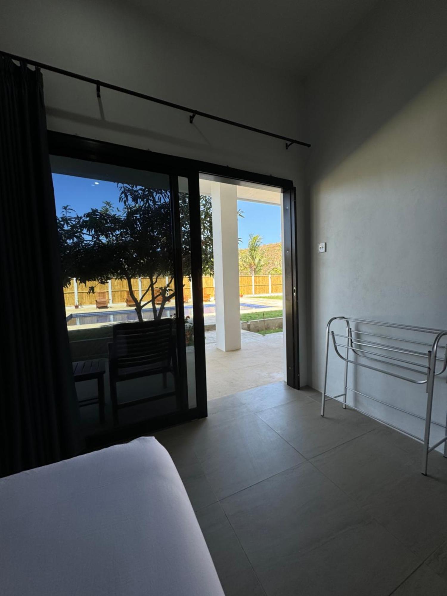 Satu Hati Hotel Ekas ภายนอก รูปภาพ